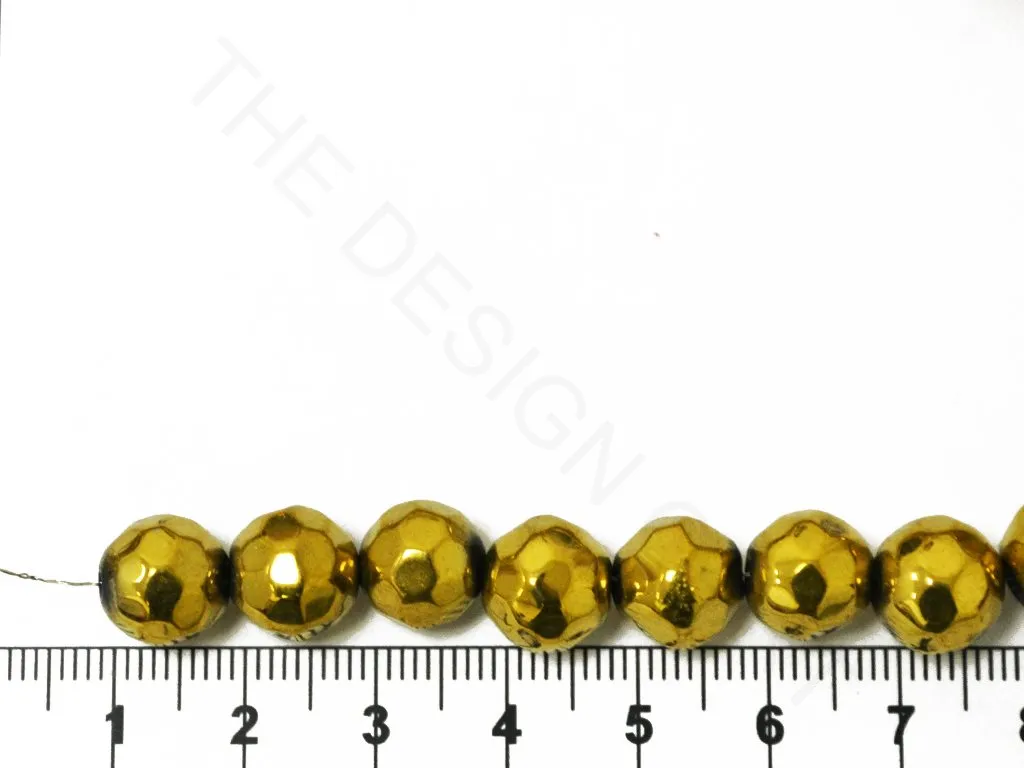 Golden Spherical Faceted Glass Beads